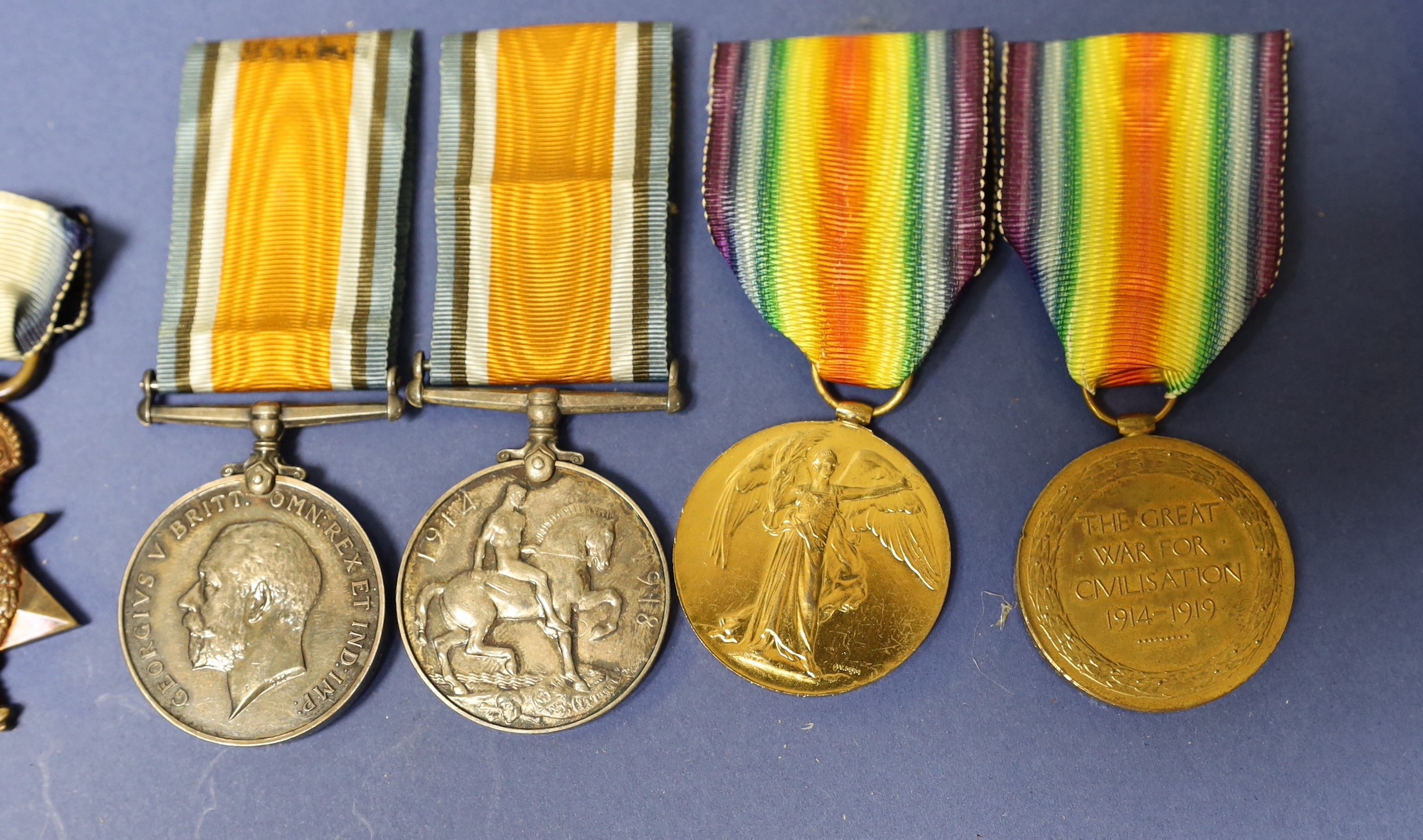 Two WWI family medal trios to 9098 Pte. A Paterson 2/R Scots. including Mons star and to 11619 Pte. A Paterson S. Gds. with miniature medals etc.